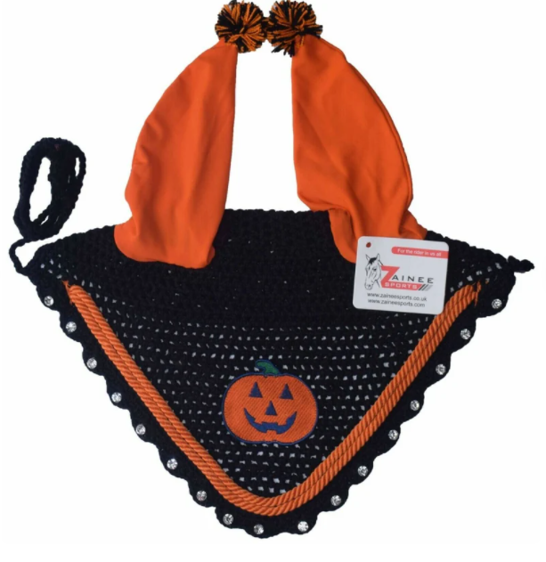 A horse ear bonnet made of black and orange material that has a pumpkin embroidered on it.