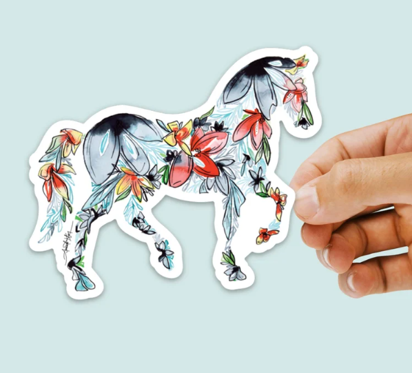 Horse silhouette sticker by AmadaKleinCo on Etsy. It shows the silhouette of a horse filled with flowers and fauna. It shows red, blue, yellow, and green colors.