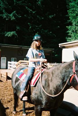 me on a horse named cherry my fav horse at a camp i went 2