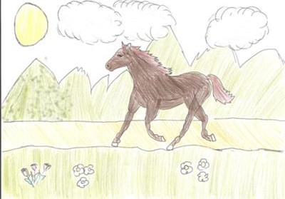 A bay horse trotting in a field with flowers. There are mountains in the back and the sun and clouds are above.
