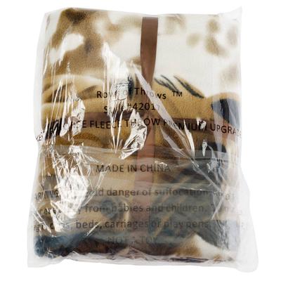 A picture of the blanket wrapped up in plastic. You can't make out an image on the blanket just brown, tan, and white colors.