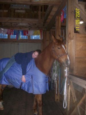 Me on Buster's Back in the barn:)