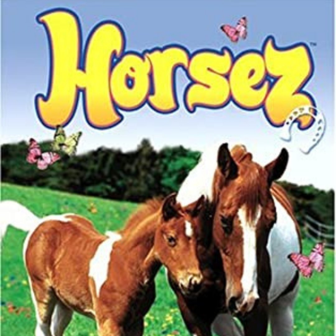 A graphic from the PC game Horsez. It shows a bay and white paint mare with a chestnut and white paint foal out in a grassy paddock with trees and a wooden fence in the background.