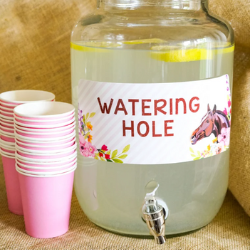 A horse sign from SunshineParties on Etsy. It shows a bay horse's head in the bottom right corner with flowers and more flowers in the bottom left corner with the words Watering Hole in the center. A horse sign from SunshineParties on Etsy. It shows a bay horse's head in the bottom right corner with flowers and more flowers in the bottom left corner with the words Watering Hole in the center.