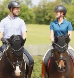 Image from Dressurfit of two people riding horses