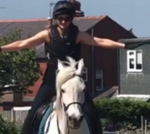 Image from Equestrian Fitness of a woman riding a horse