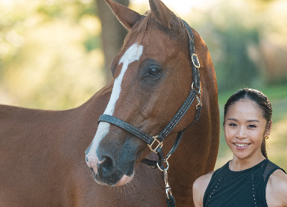 Image from Haybales and Barbells of a woman with a chestnut horse