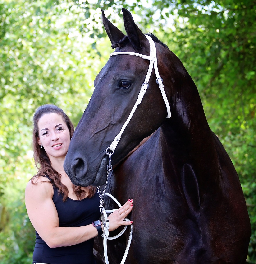 Image from Ridercise of a woman with a horse